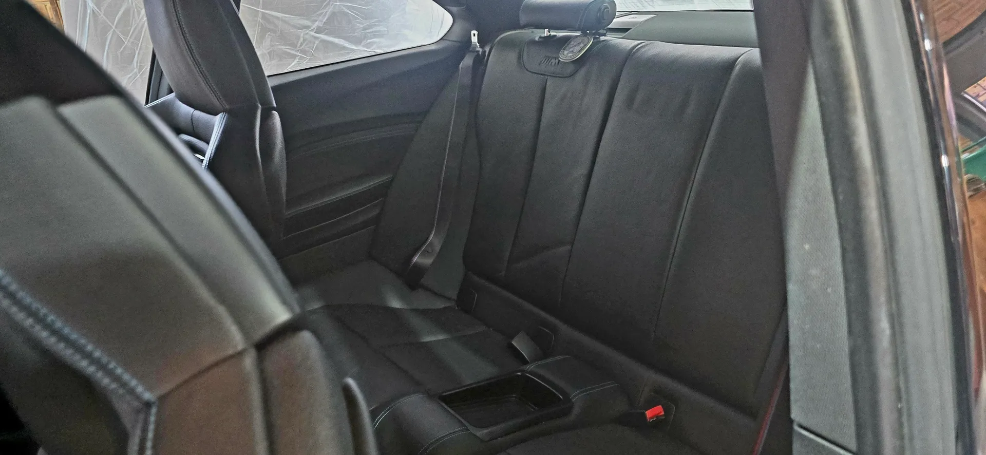 White BMW 318i dashboard and steering wheel
